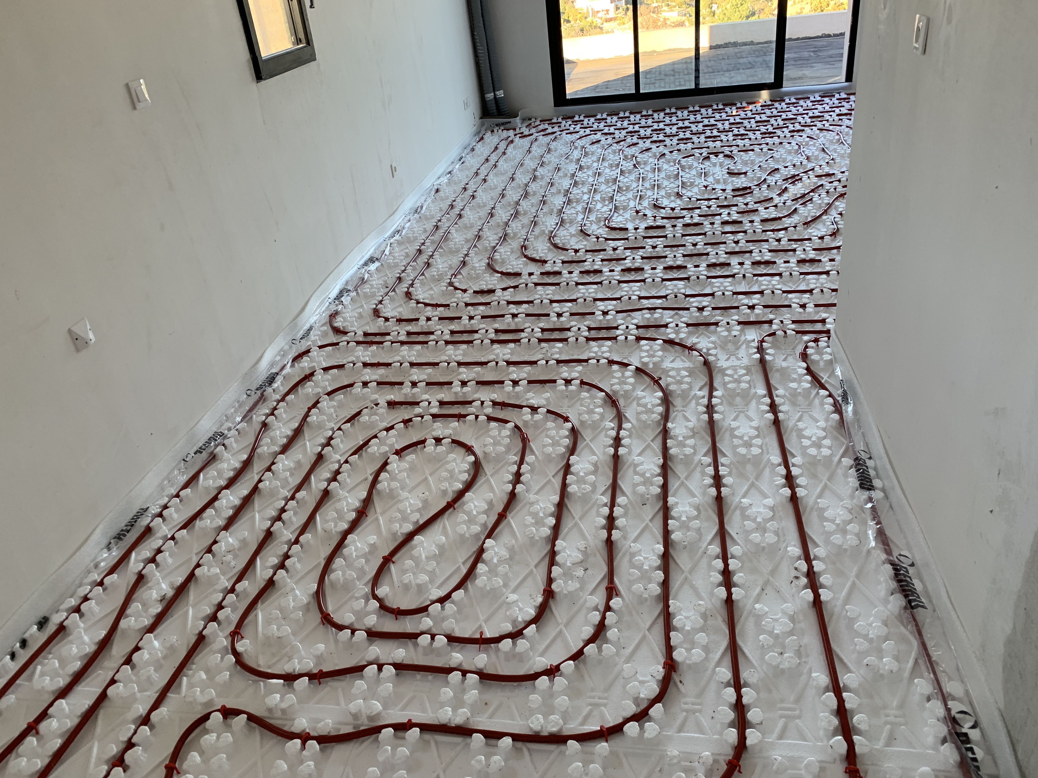 Collecteur de plancher chauffant repéré pièce par pièce